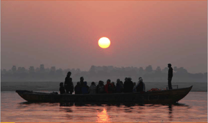 Boat sailing into the sunset 