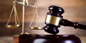 Gavel representing compliance 
