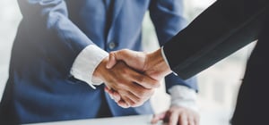 Two people agreeing on how regulation rules and principles differ. 